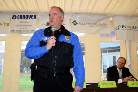 Kirkland Police Chief Eric Olsen addresses a crowd of nearly 100 as he discusses crime in Kirkland during a Kirkland Chamber of Commerce luncheon at the Woodmark Hotel Tuesday. Also pictured is King County Prosecutor Dan Satterberg.