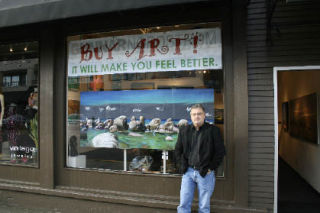Gunnar Nordstrom stands in front of his Lake Street gallery that will soon move to Bellevue