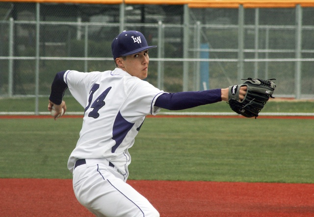 Lake Washington High junior Nick Ludwig throws out a pitch midway through the Kangaroo’s 12-0 win over Interlake on Monday