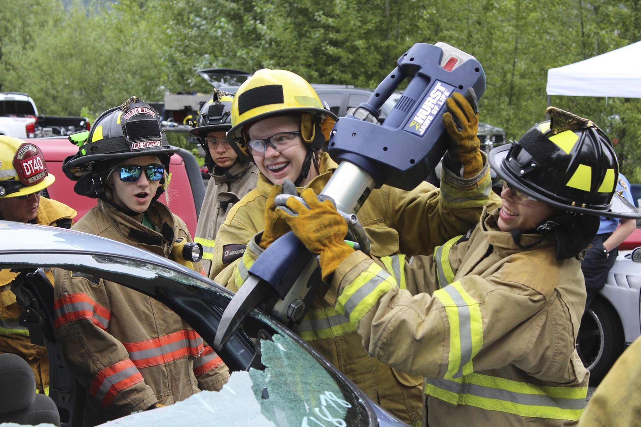 Women from around the Eastside train with the jaws of life during a firefighting camp in Bellevue. Allison DeAngelis/Bellevue Reporter