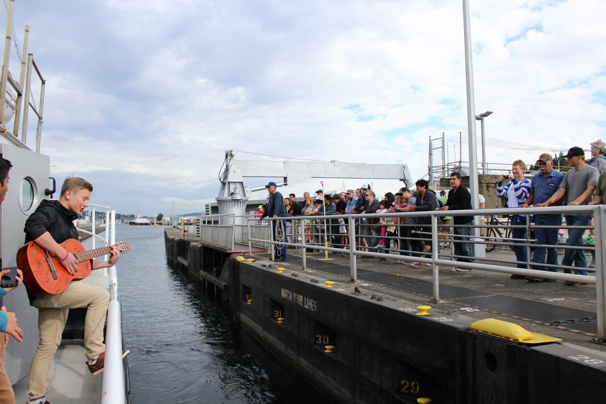 Lake Washington High School student Dylan Sabine plays a tune on board a ship during his month-long internship with the University of Washington School of Oceanography. ALLISON DEANGELIS/Reporter Newspapers