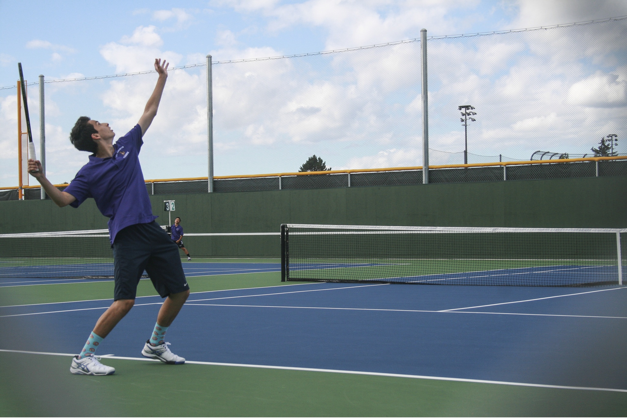 LWHS sophomore Alex Levine serves during a match on Sept. 8. JOHN WILLIAM HOWARD/Kirkland Reporter