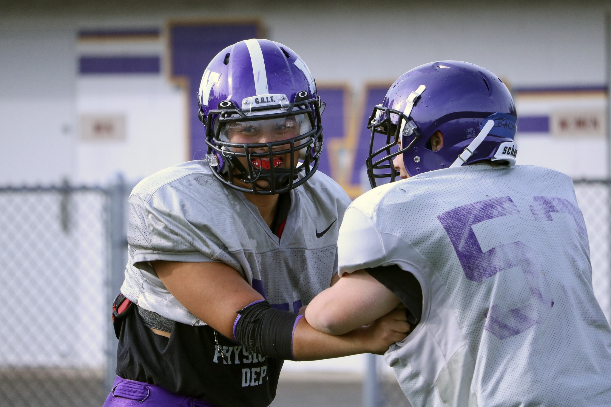 Lake Washington senior Jackie Castro takes part in drills during practice with her fellow lineman earlier this season. Castro has been part of the program since she was a freshman