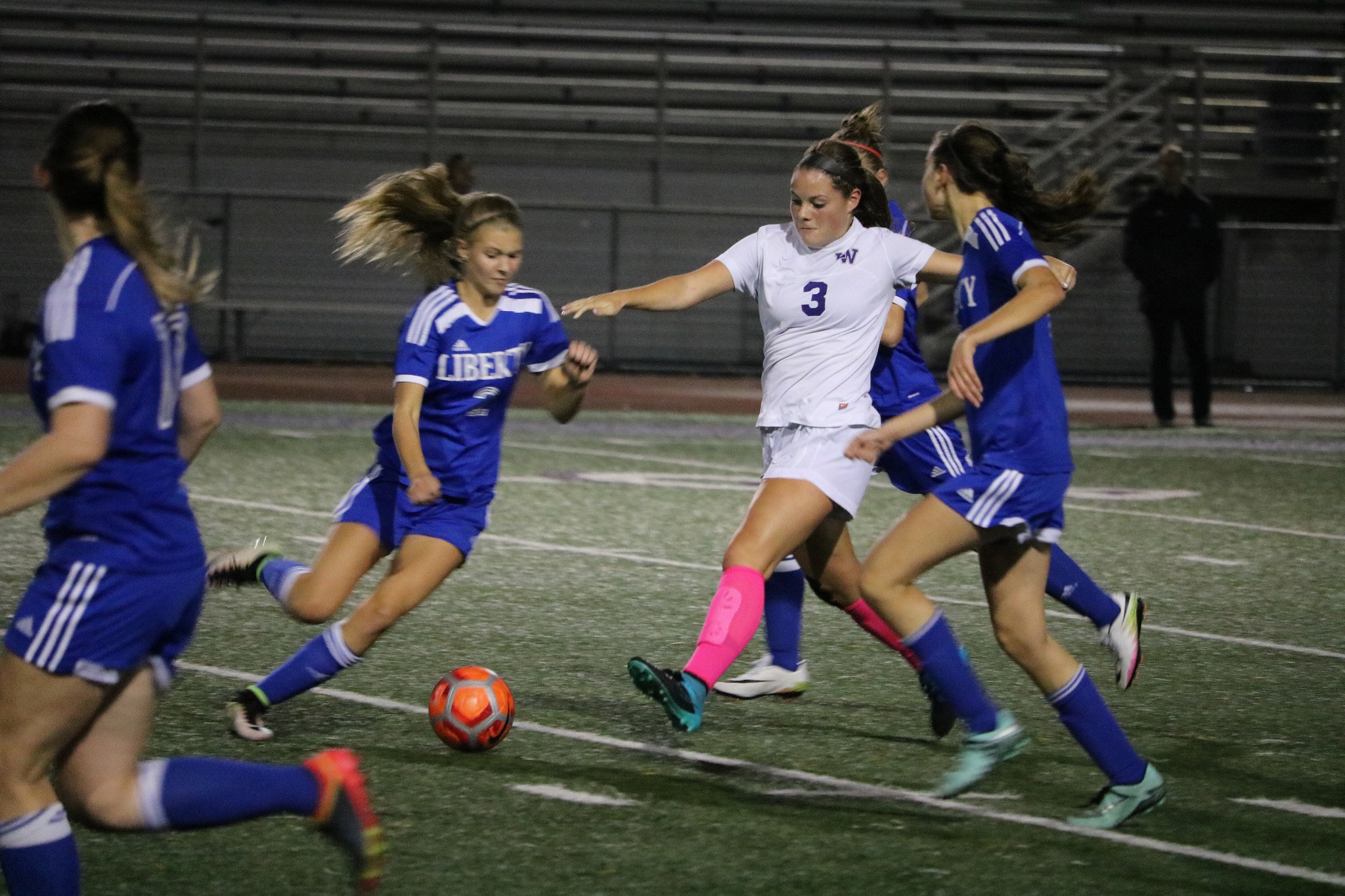 Lake Washington senior Natalie Vetto is surrounded by defenders during the Kangs’ 2-1 loss to Liberty on Thursday at Mac Field in Kirkland. JOHN WILLIAM HOWARD/Kirkland Reporter