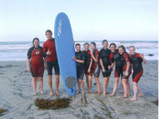 Girl Scout Troop 42137 learn how to surf during a recent trip to San Diego. From left: Hayley Fannin