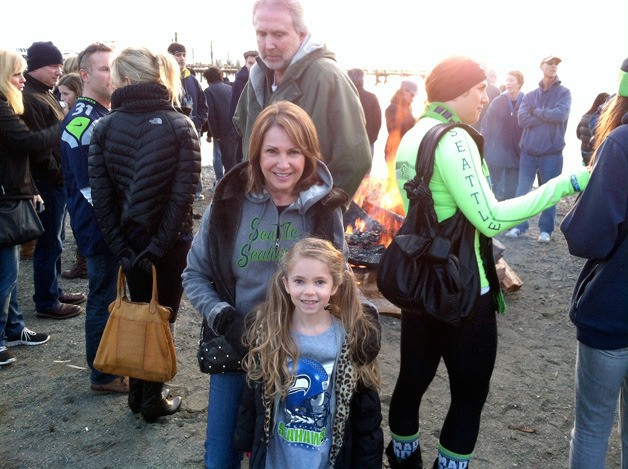 Elaine Loveland and her granddaughter at a Seahawks rally in Kirkland.