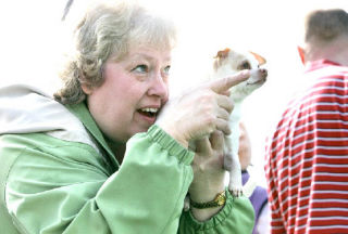 Liz Mills gives her friend’s Chihuahua