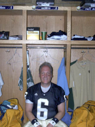 Chris Secreto sits at his locker in the Notre Dame football team’s locker room.