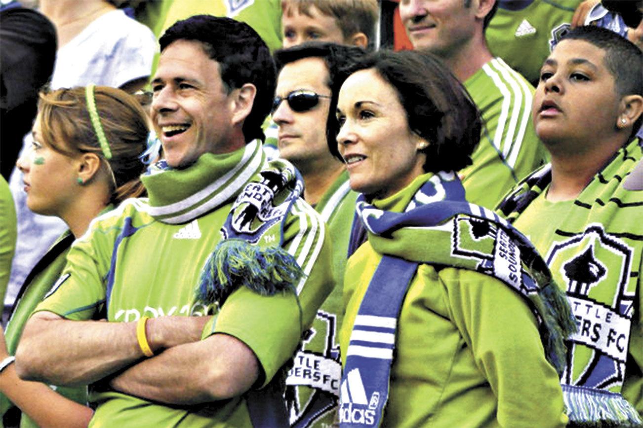 Sen. Andy Hill died Tuesday of lung cancer. He is seen here at a Sounders game with his wife Molly. Reporter file photo