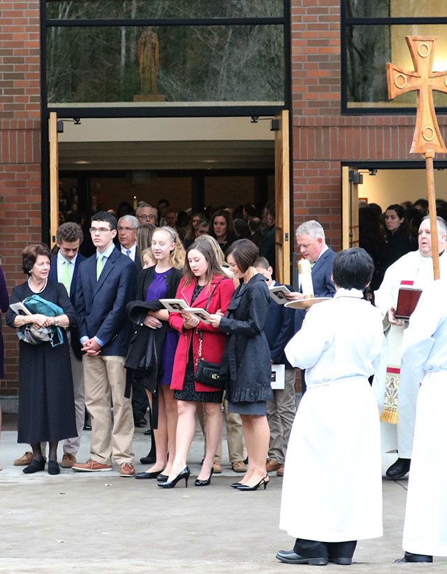 Sen. Andy Hill’s family exits the St. Jude Parish church this afternoon in Redmond following a memorial funeral mass. Andy Nystrom, Redmond Reporter