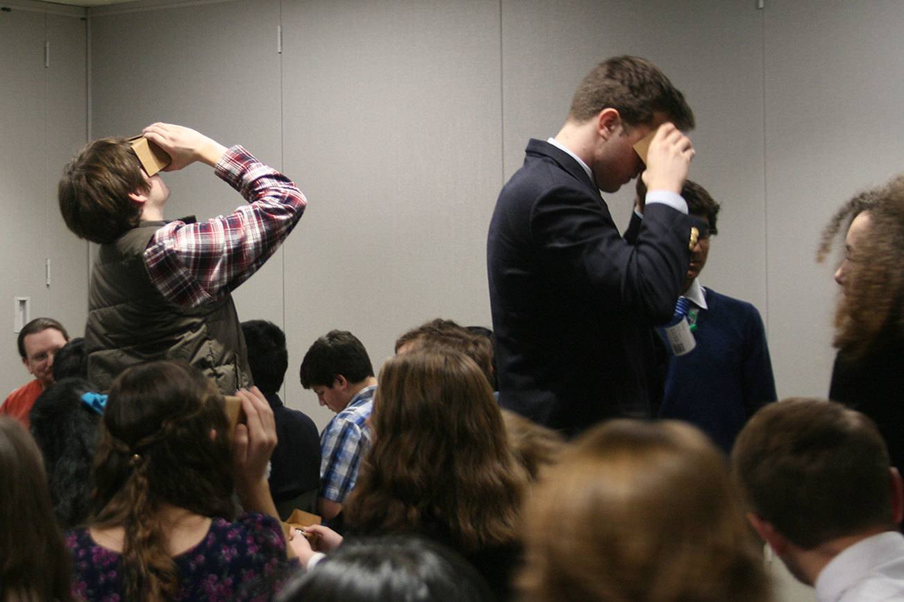 Area high school students try out Google Cardboard devices during a tour of the Google Kirkland campus. CATHERINE KRUMMEY / Kirkland Reporter