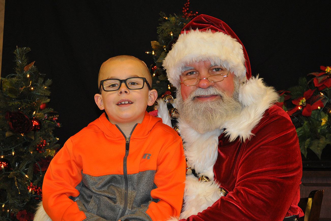 Bridle Trails Red Apple Market is fundraising throughout the month of December for Mason Gordon, who was diagnosed with brain cancer four years ago and is currently undergoing proton radiation treatment. A raffle with proceeds benefitting Mason and his family will take place from 11 a.m. to 1 p.m. Dec. 10 at the market as part of Red Apple’s Santa Saturday. Contributed photo