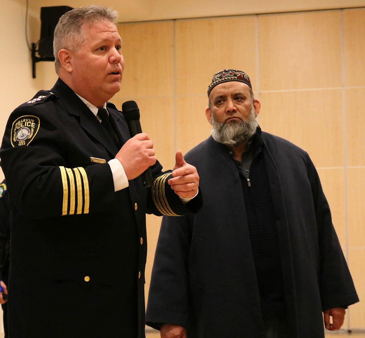 Bellevue Police Department Chief Steven Mylett interacts with Imam Sheikh Fazal of the Islamic Center of Eastside during the Eastside Muslim Safety Forum. ANDY NYSTROM, Redmond Reporter