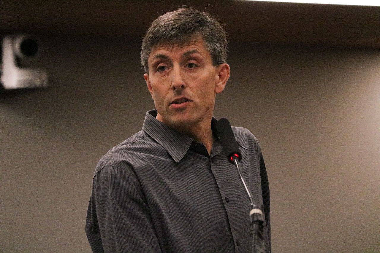 James Young, owner of Seaplane Scenics, speaks during a special meeting with the Hearing Examiner on Monday, Jan. 30 at Kirkland City Hall. JOHN WILLIAM HOWARD/Kirkland Reporter