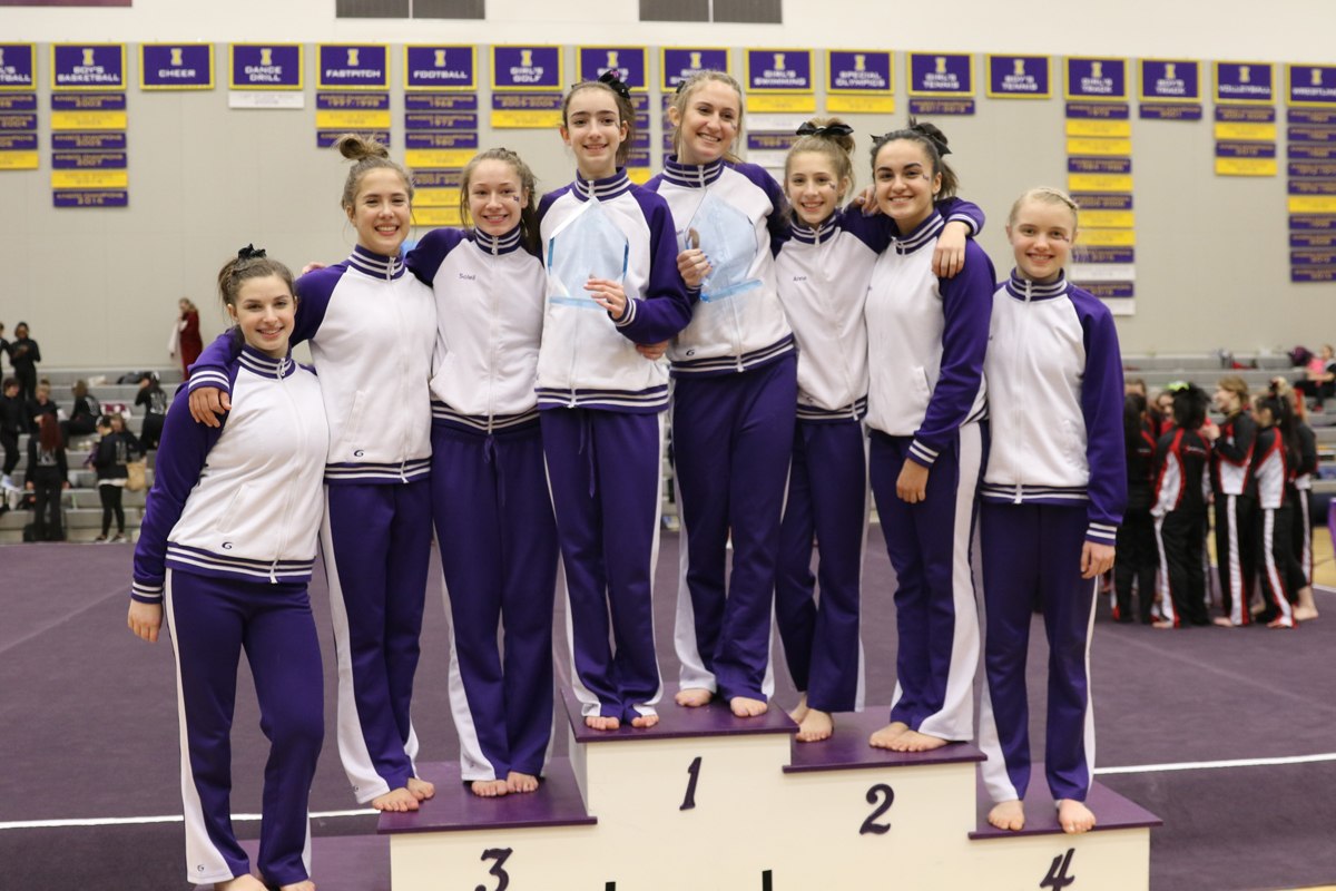 From left: Lake Washington High School gymnasts Paige Chickering, Audrey Arnold, Kaysha Walford, Eden Netz, Yael Pasumansky, Anna Merlino, Sonya Amirzehni and Joeli Pence. The Kangs finished first at the KingCo 2A/3A meet on Saturday in Issaquah. WILLY PAINE/Courtesy photo