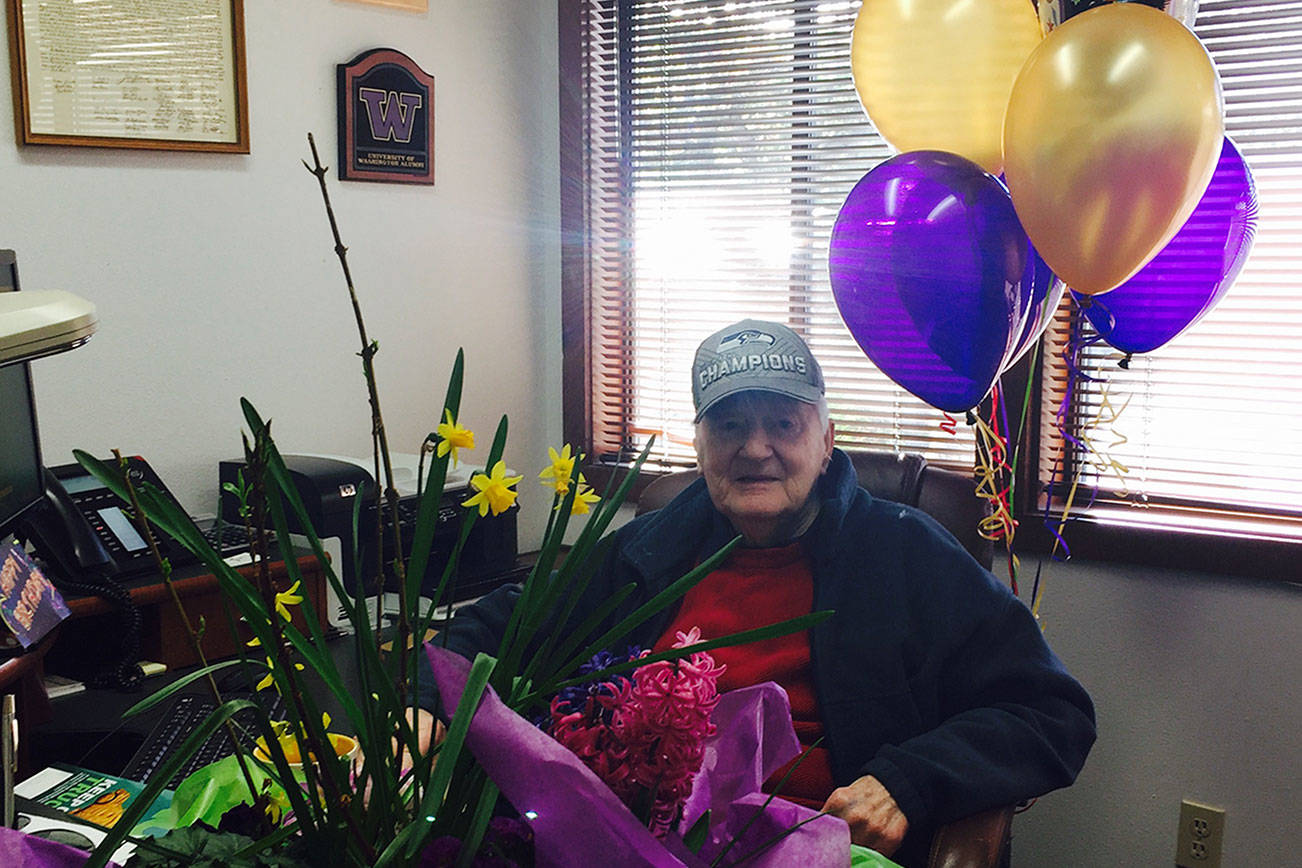 Russ Parthemer celebrates his 90th birthday at Totem Agencies in Kirkland. He started the business, which is now run by his sons, in 1975. Contributed photo