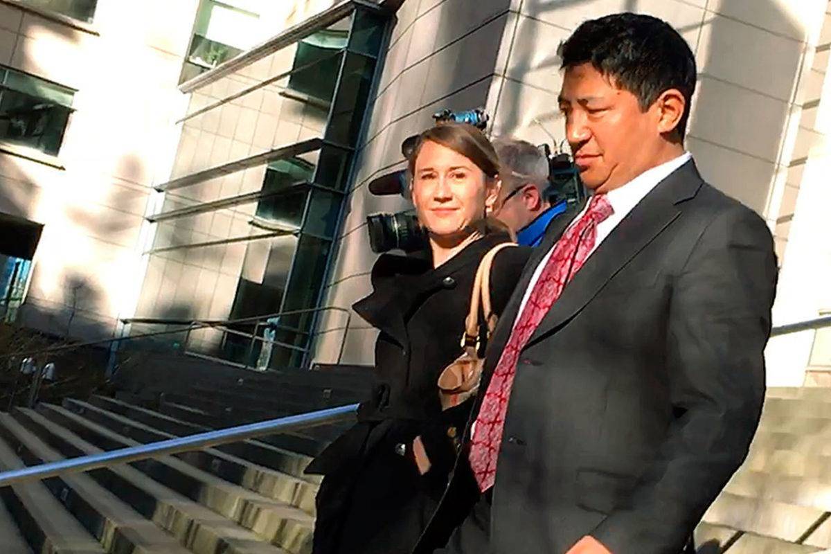 Lobsang Dargey is shown here leaving the U.S. District Court building in Seattle on Jan. 4 after pleading guilty to fraud charges. Dan Catchpole/Herald file