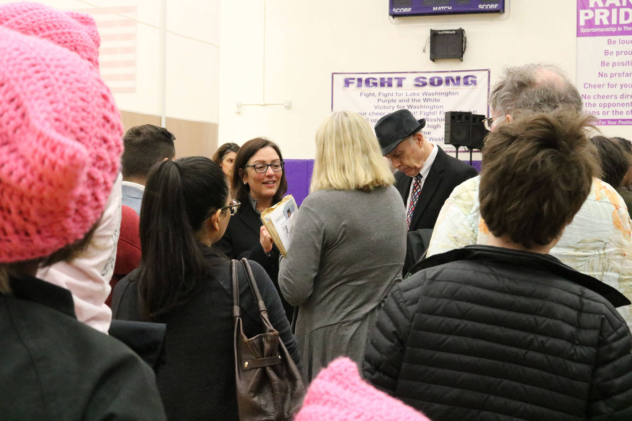 Congresswoman Suzan DelBene (center) speaks with constituents following a town hall event at Lake Washington High School in Kirkland. CATHERINE KRUMMEY / Kirkland Reporter