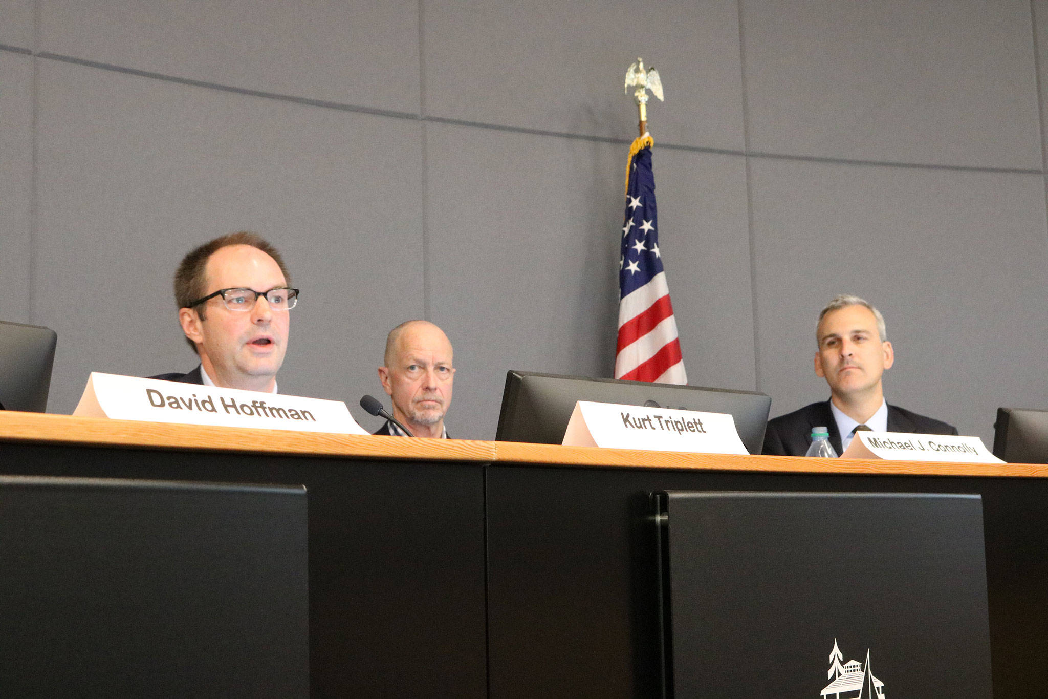 Kirkland City Manager Kurt Triplett speaks as Michael J. Connolly of Windermere Real Estate and Puget Sound Regional Council Executive Director Josh Brown listen during a housing panel at Kirkland City Hall. CATHERINE KRUMMEY / Kirkland Reporter