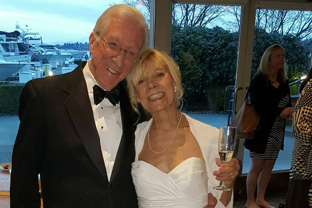 Hal and Anya Bomgardner celebrate at their wedding reception at Le Grand Bistro Americain in Kirkland. Courtesy photo