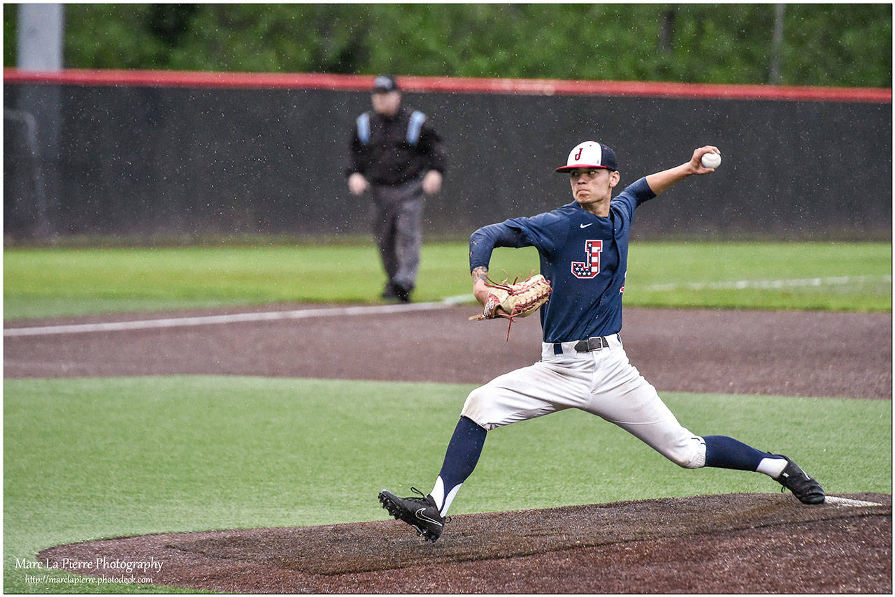 Juanita’s JD Worcester fires away against Redmond on Tuesday. Courtesy of Marc LaPierre Photography, http://marclapierre.photodeck.com