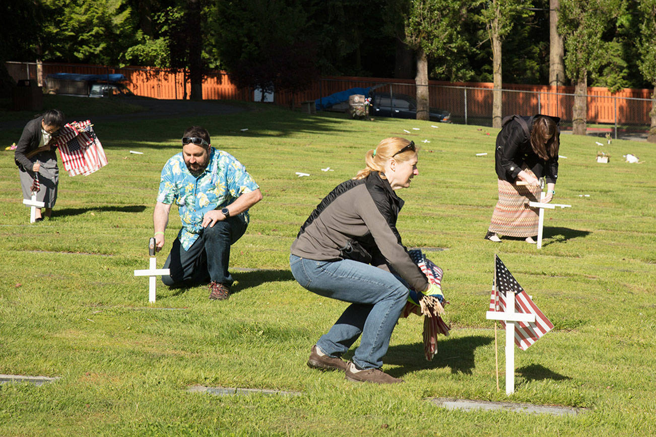 Volunteers recognize veterans at Kirkland Cemetery
