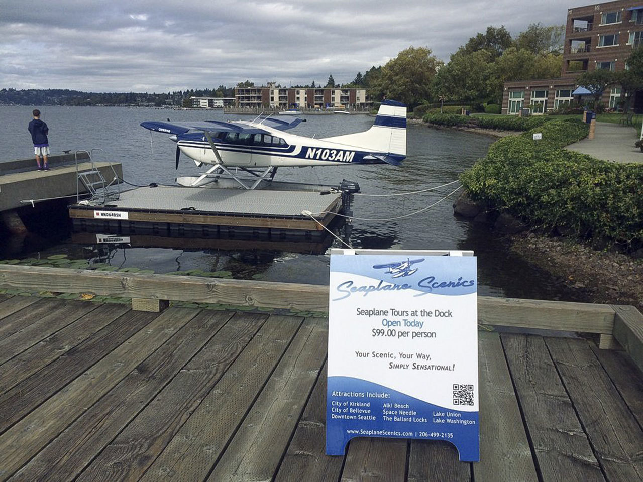 A seaplane sits moored at the guest pier in front of the Woodmark Hotel at Carillon Point. Contributed photo