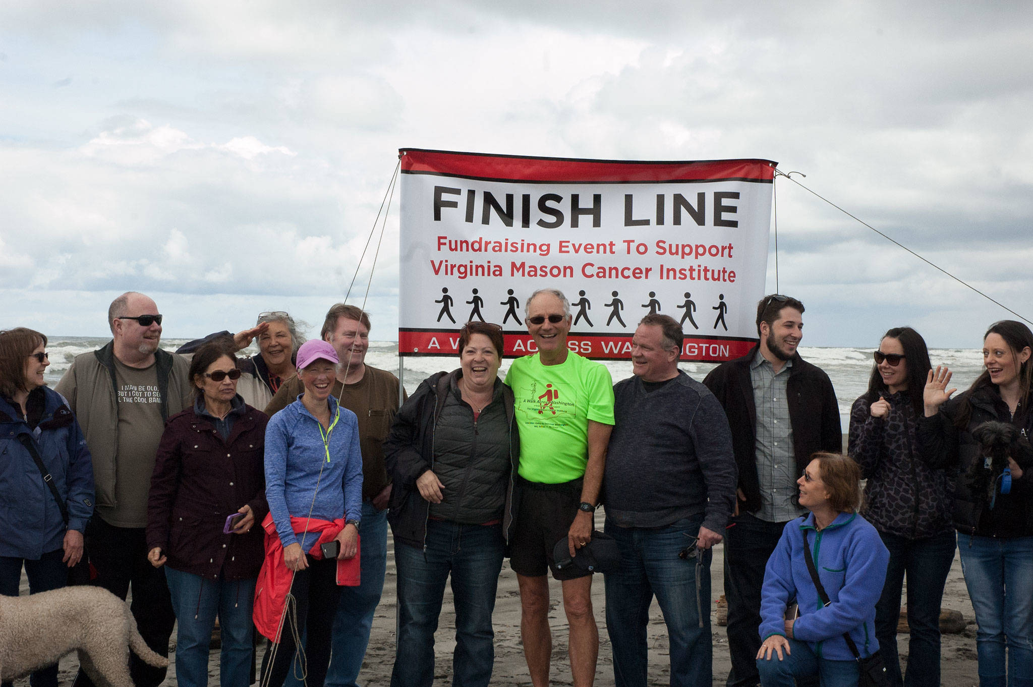 Don Muggli (center) is greeted by family members and friends for the finish of his Walk Across Washington event near Seaview, Wash. Courtesy photo