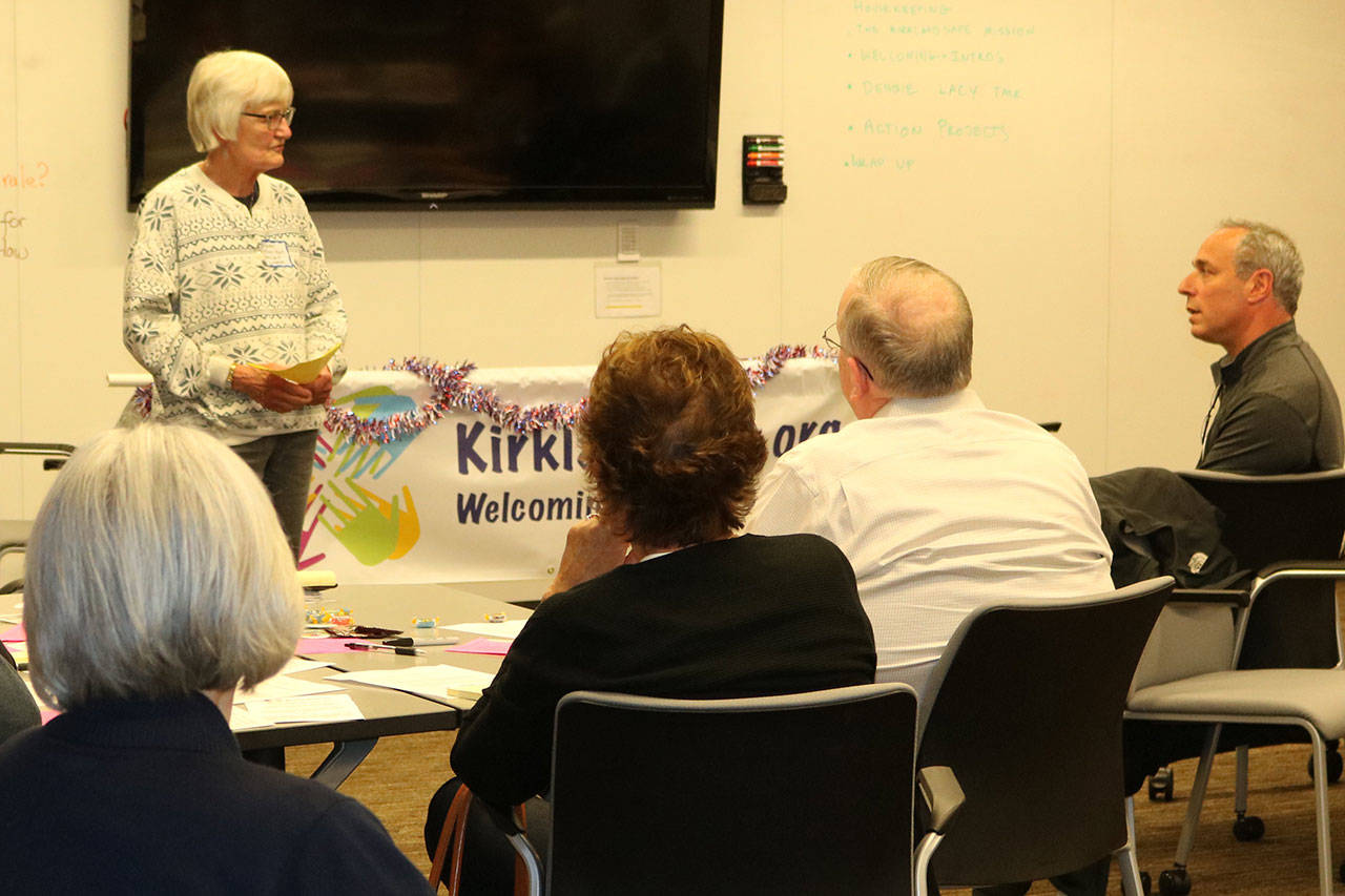 Holy Spirit Lutheran Church associate pastor Mary-Alyce Burleigh discusses how her church has been helping refugee families from Iraq and Uganda get settled in Kirkland at the first KirklandSafe meeting. CATHERINE KRUMMEY / Kirkland Reporter