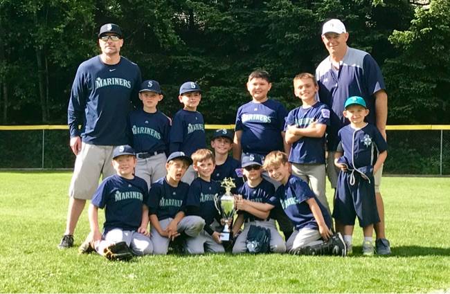 The Kirkland American Little League Mariners recently beat the Kirkland National Little League Giants, 14-3, for the city Minors championship. The Mariners are: Standing left to right - coach - John Alexander, Drew Roberts, Scott Alexander, Carter Malmborg, Chris Macias, coach Scott Roberts and Brock Roberts. Kneeling left to right - William LaCombe, Christian Barth, Milo Magnano, Austin Coupe, Austin Floyd and Kai Saddler. Not pictured - coach Mike Stevens, Oliver Stevens and Charlie Heuberger. Courtesy photo