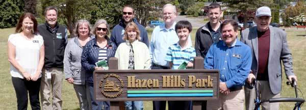 Kirkland city councilmembers, city staff and community members celebrate the donation of Hazen Hills Park to the City of Kirkland from the Hazen Hills Homeowners Association. Photo courtesy of City of Kirkland