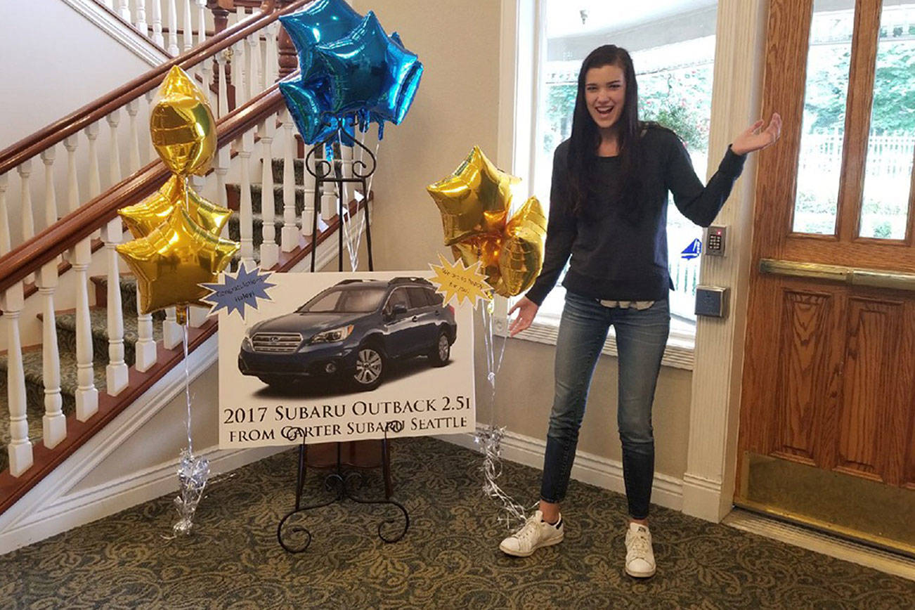 Local nursing student wins a car in local business’s anniversary raffle
