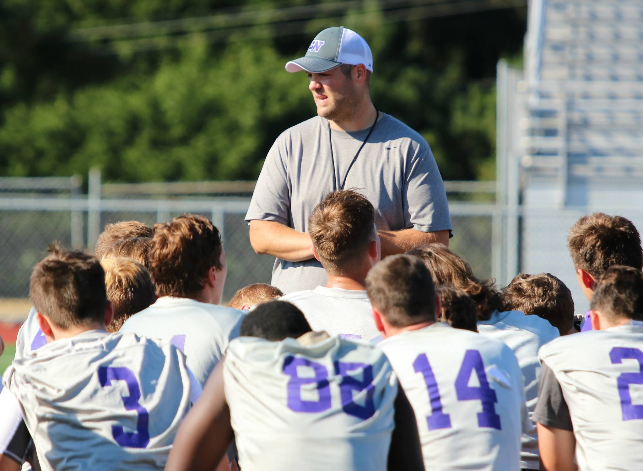 Lake Washington head coach Andy Arena speaks with his players after a recent practice. Andy Nystrom, Kirkland Reporter