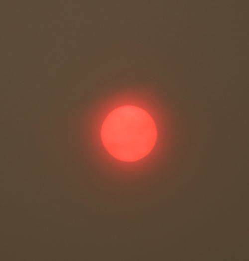 A hazy red sun this morning was caused by wildfires. Andy Nystrom, Reporter Newspapers