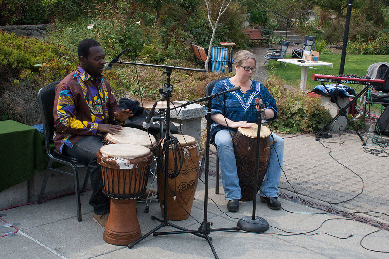 Eugene “Yaw” Amponsah performs Ghanaian percussion during the “Welcome to Kirkland” event hosted by the Juanita Neighborhood Association on Saturday. Megan Campbell, Kirkland Reporter