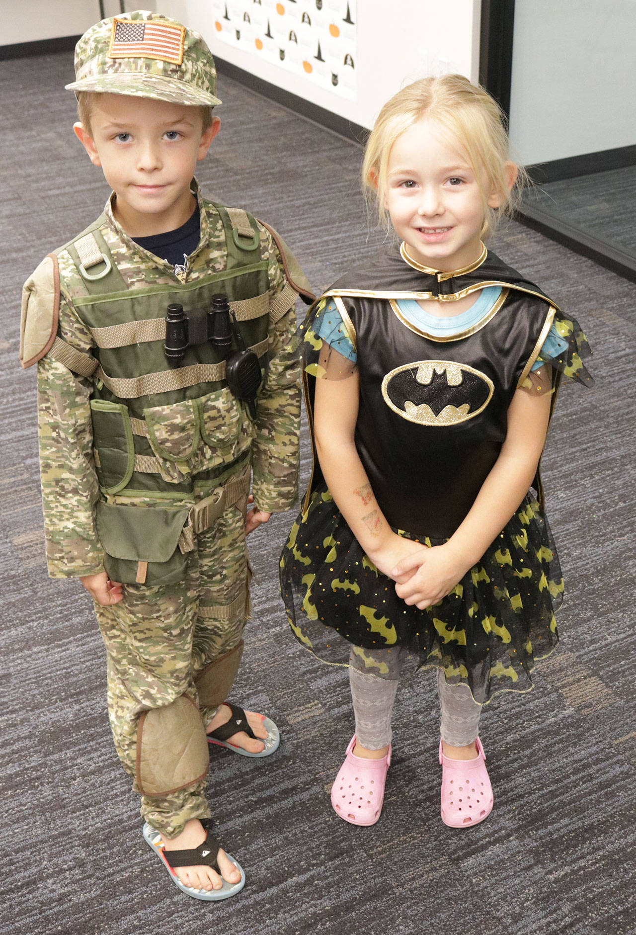 Austin Pilcher, 6, and his younger sister Sara, 4, show off their costumes during the City of Kirkland’s Halloween Costume Swap Saturday. Megan Campbell/Kirkland Reporter