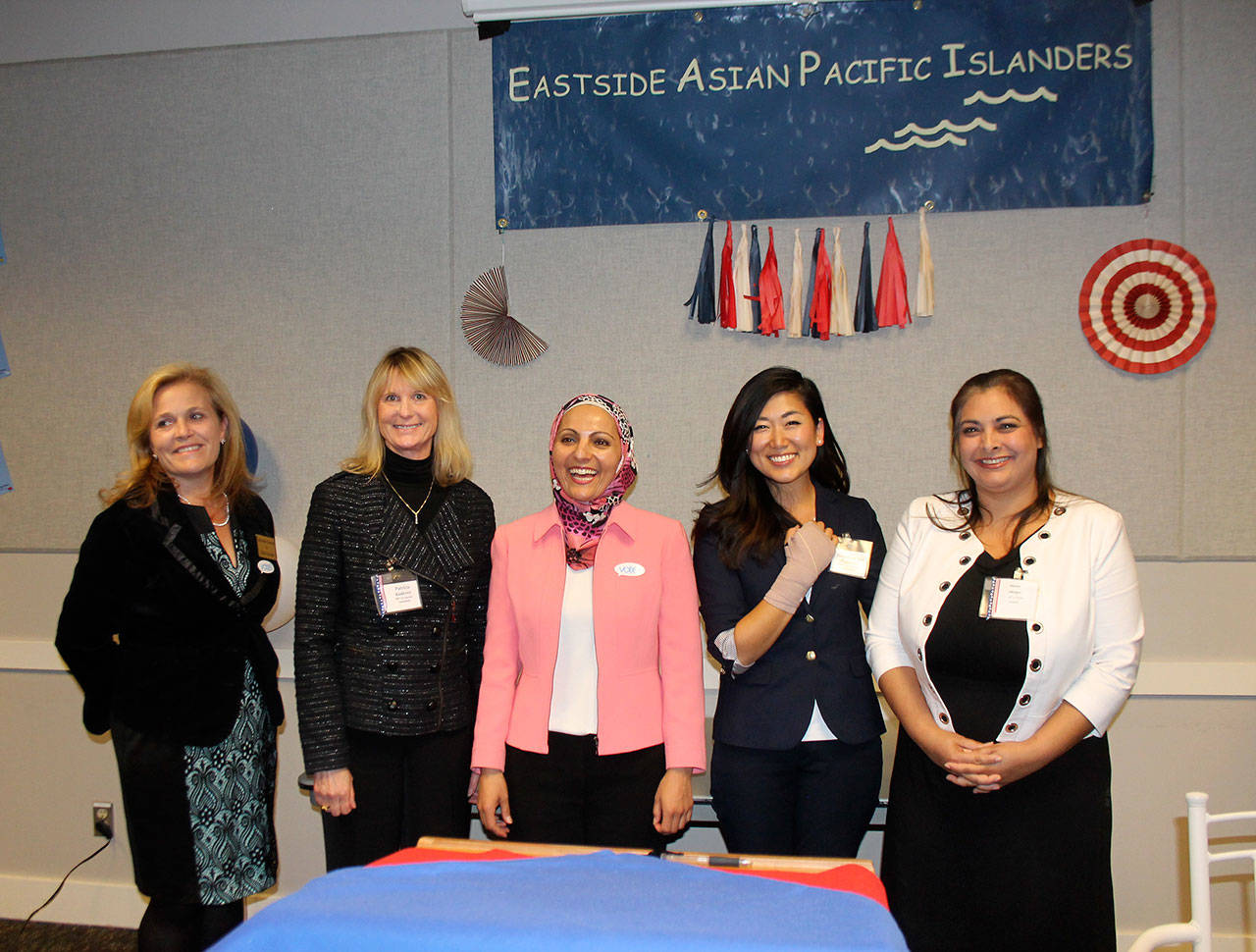 From left, Michell Darnell, Patty Kuderer, Indian Association moderator, Jinyoung Lee Englund, and Manka Dhingra at the Eastside Candidates Forum on Thursday. Raechel Dawson/staff photo