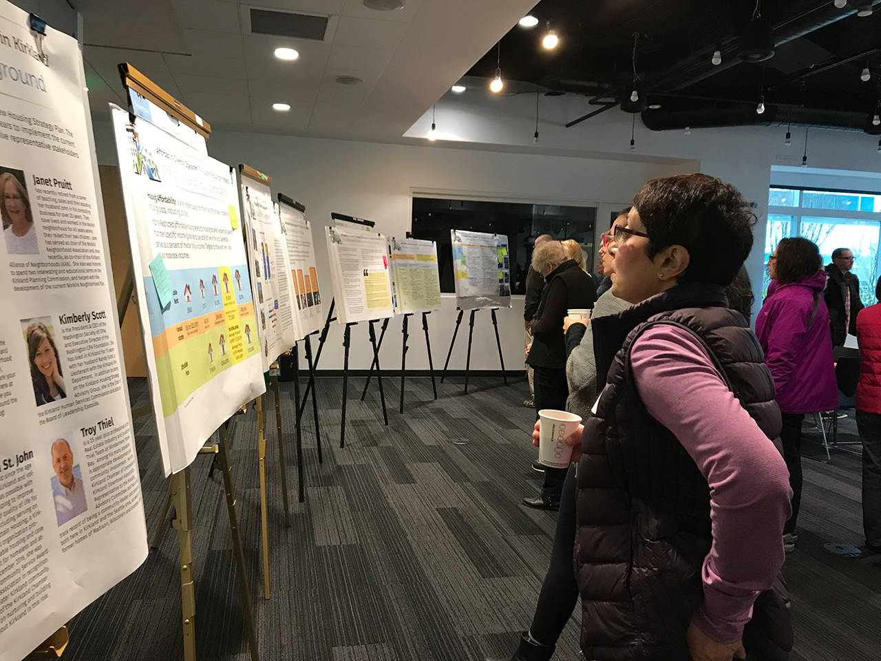 The Kirkland Housing Strategy Advisory Group displayed information boards with their findings so far for participants to read over at the beginning of the workshop. Samantha Pak, Kirkland Reporter