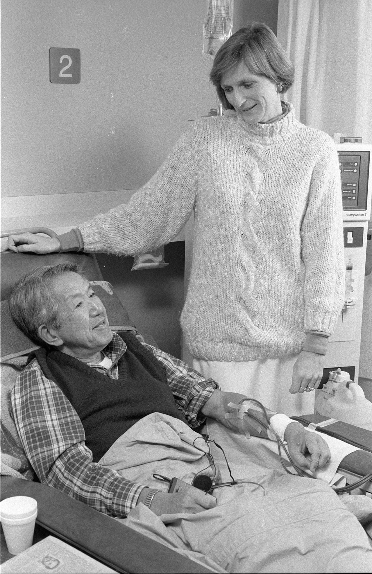 Connie Anderson with a patient during her earlier days as a nurse at the Northwest Kidney Centers. Courtesy of Northwest Kidney Centers
