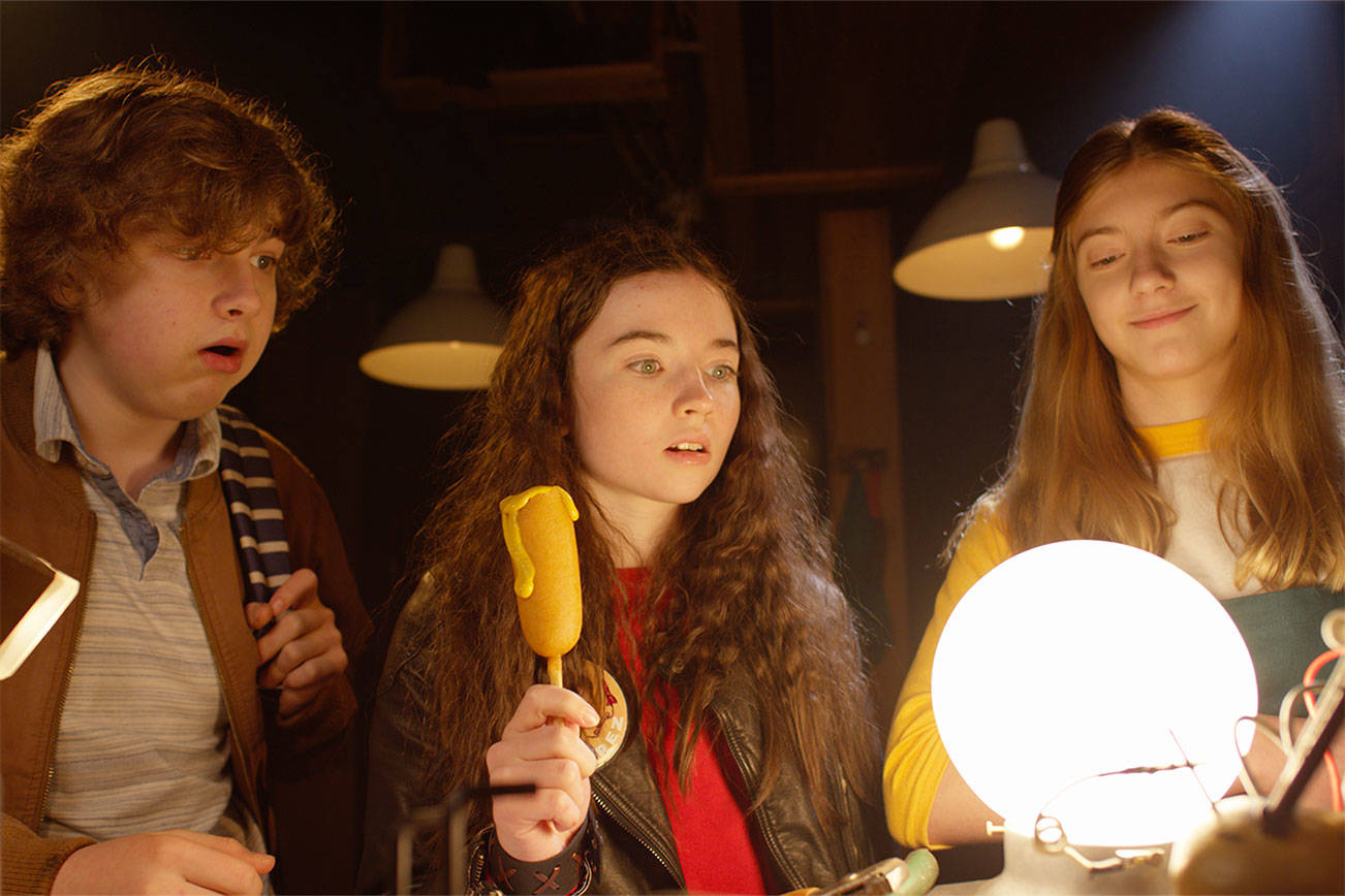 Kirkland resident Mary Madaline Roe (right), Eden Campbell (middle) and Morgan Chandler (left) act in a scene during the filming of “They Reach.” Courtesy of Single Schred Films