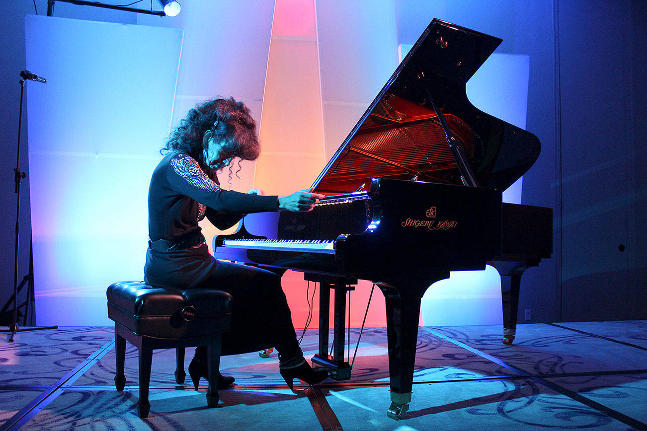 Lisa Downing performs at a Whisperings Radio concert. Courtesy of Whisperings Solo Piano Radio
