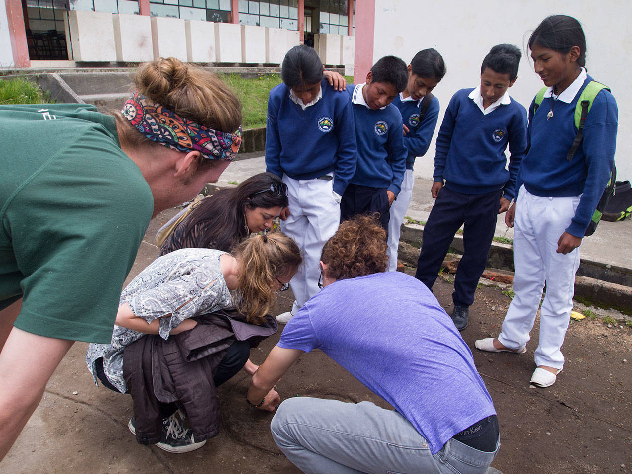 As part of an introduction to Afro-Ecuadorian and indigenous communities, Omnibus 119 visited a school for Kichwa students north of Quito. While on the playgrounds, groups of students made sure they said hello to each person before teaching them games, including a marble maze scratched into the dirt. Photo courtesy of Emma Tremblay