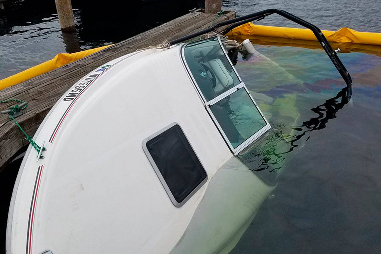 Boat sinks at Kirkland marina, leaking fuel into Lake Washington