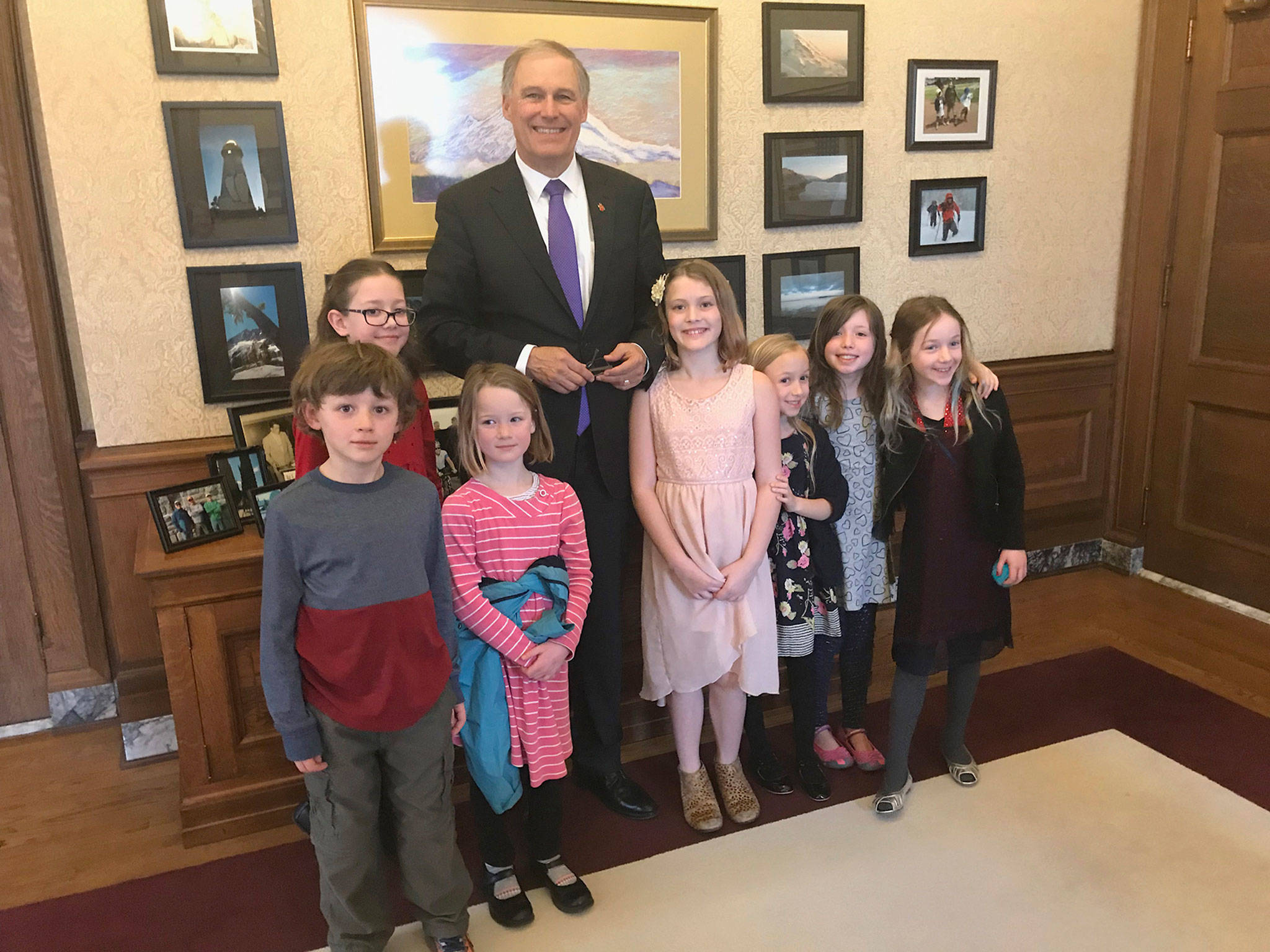 Local students Finn, Nora, Margaret, Lucia, Kaileigh, Megan and Becky meet with Gov. Jay Inslee, after some of them started a campaign to ban plastic bags. Photo courtesy of Angela Pifer