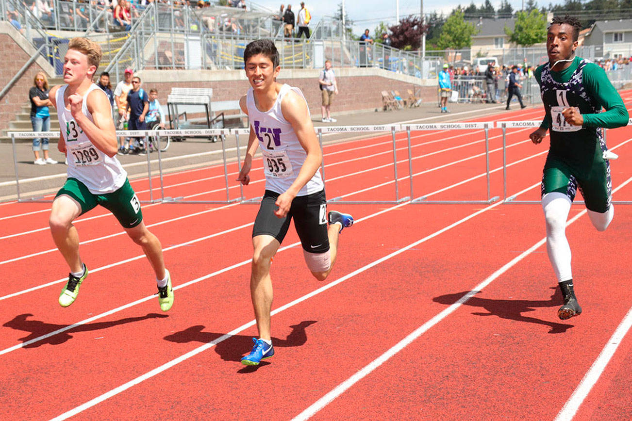Photo courtesy of Don Borin/Stop Action Photography                                Lake Washington Kangaroos senior Xavier Betancourt, center, earned sixth place with a time of 40.43 in the 300 hurdles at the Class 3A state track meet on May 26 at Mount Tahoma High School in Tacoma.