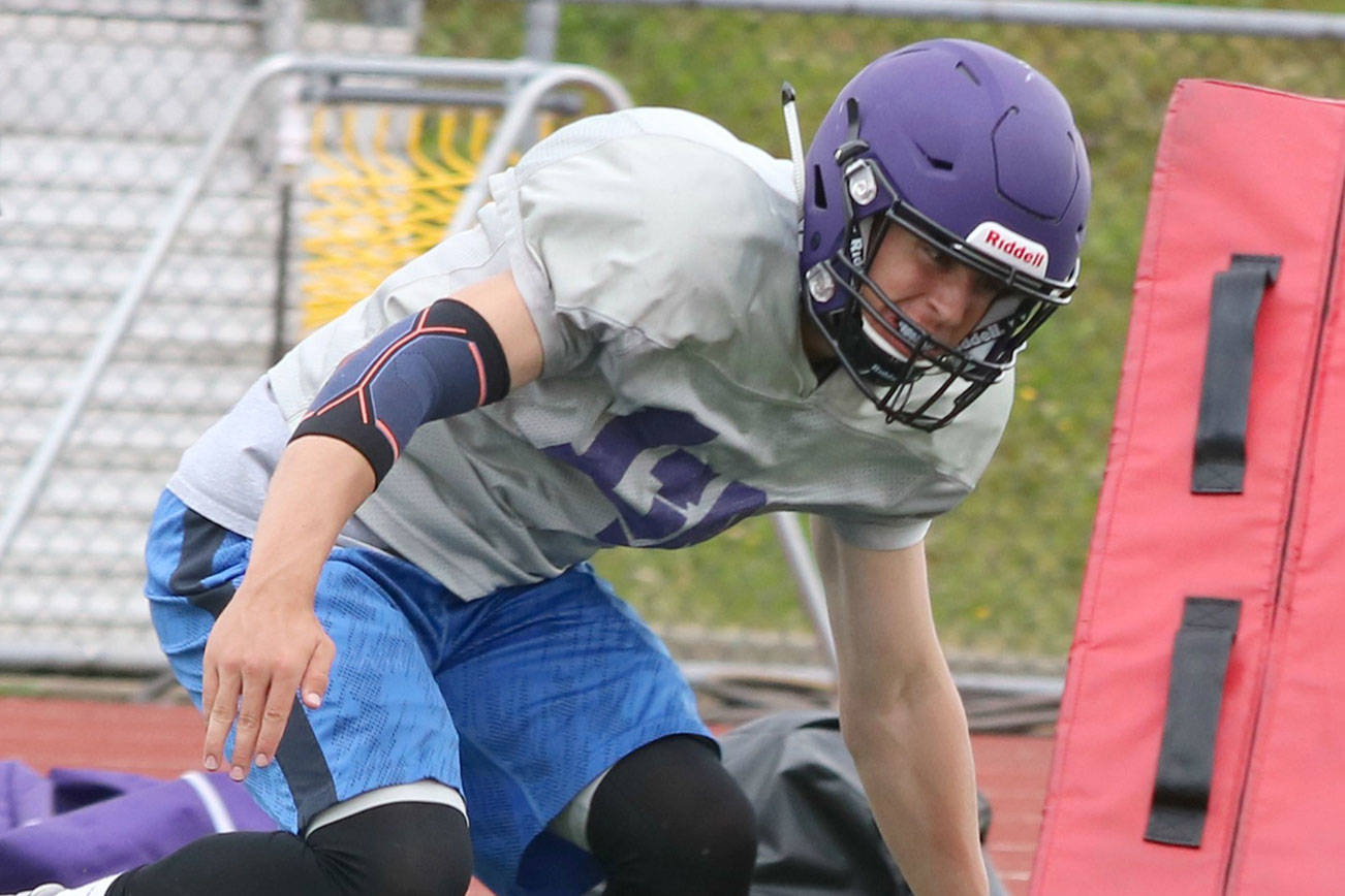 Kang players, coaches fired up at spring football practices