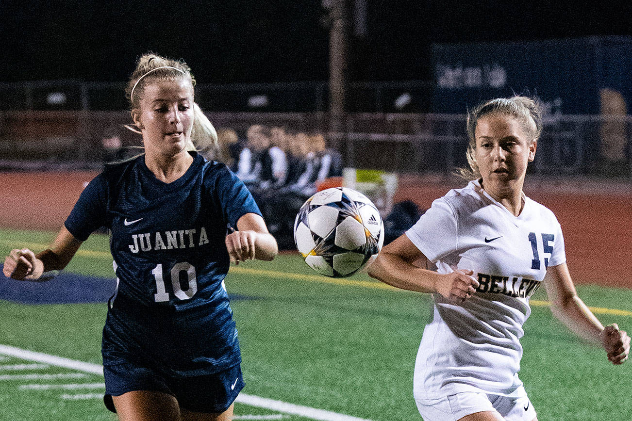 Juanita senior Allyson Ingersoll, left, and Bellevue freshman midfielder Kendall Serres, right, battle for possession of the ball. The Rebels defeated the Wolverines 1-0 on Sept. 27 at Juanita High School in Kirkland. Photo courtesy of Stephanie Ault Justus