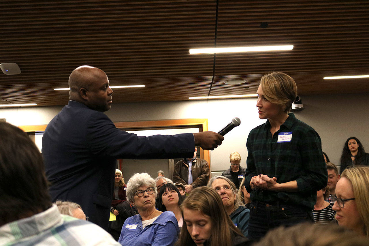 Community members state what they want to see changed as Kirkland moves forward from the Menchie’s incident. Other attendees would then hold up a number of fingers to indicate how much they agreed with the statement. Kailan Manandic, staff photo