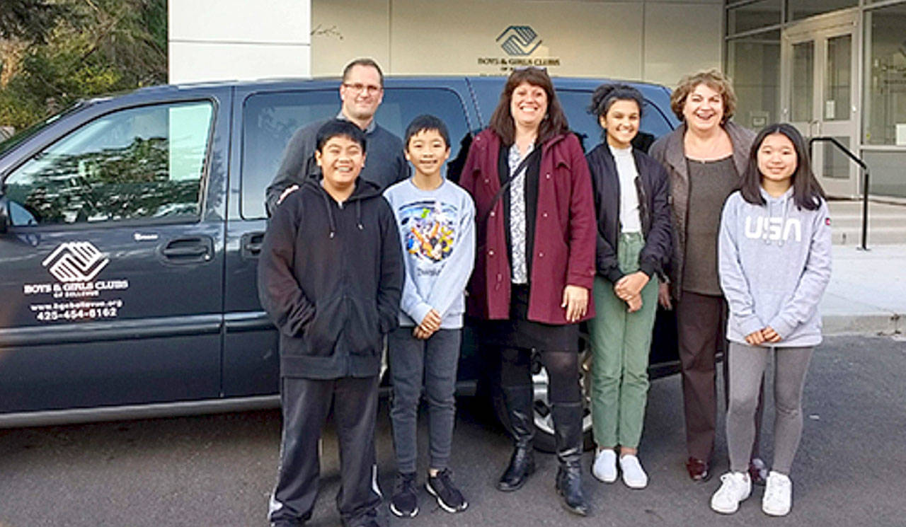 The Boys and Girls Clubs of Bellevue also received a van from King County. BGCB President/CDO Ryan Scott, BGCB President/CEO Kathy Haggart, and members of the club receive van from Councilmember Claudia Balducci. Courtesy of King County.
