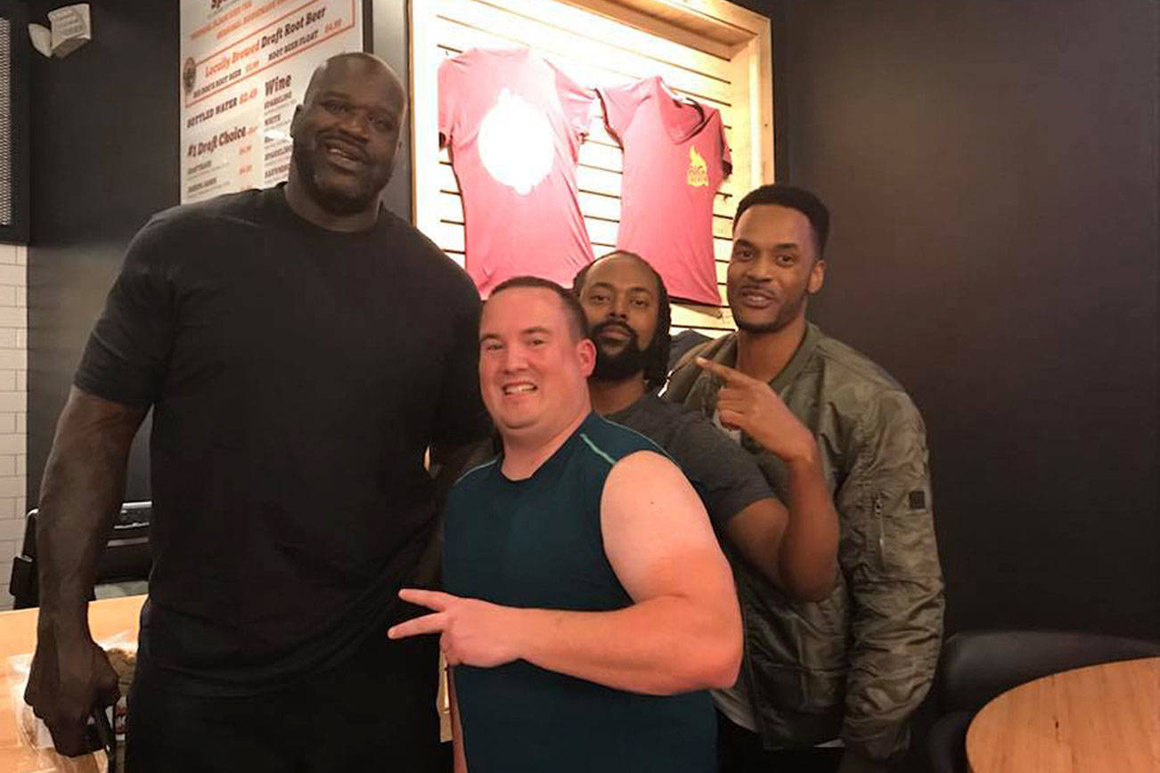 Sportswriter Shaun Scott and his friends Brian Walker and Tony Walker met NBA legend Shaquille O’Neal at Big Chicken restaurant in Las Vegas, Nevada on Nov. 24. Courtesy photo